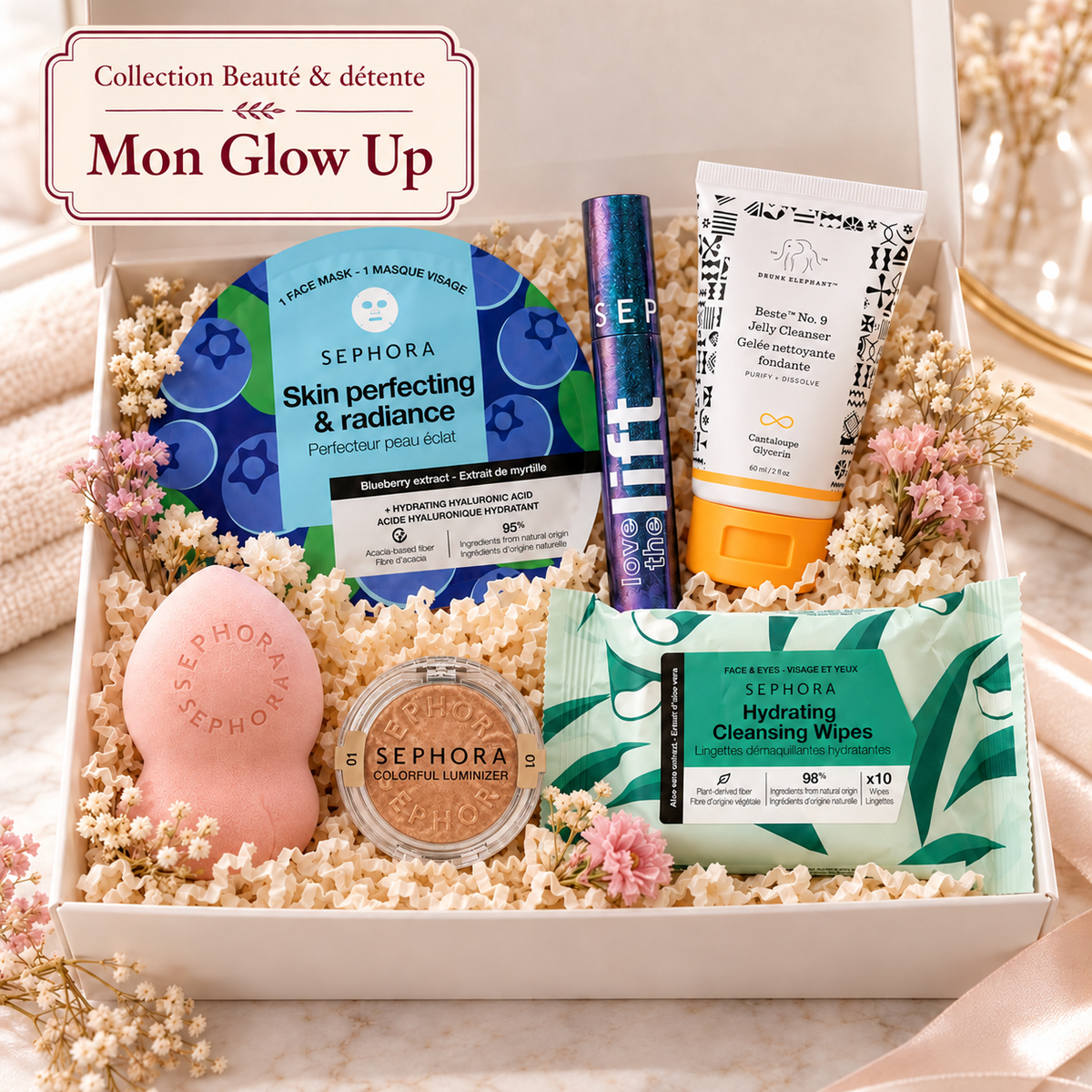 Coffret cadeau beauté jeune femme Mon Glow Up Lainoha avec masque Sephora à la myrtille, mascara, enlumineur, éponge, lingettes et nettoyant Drunk Elephant.