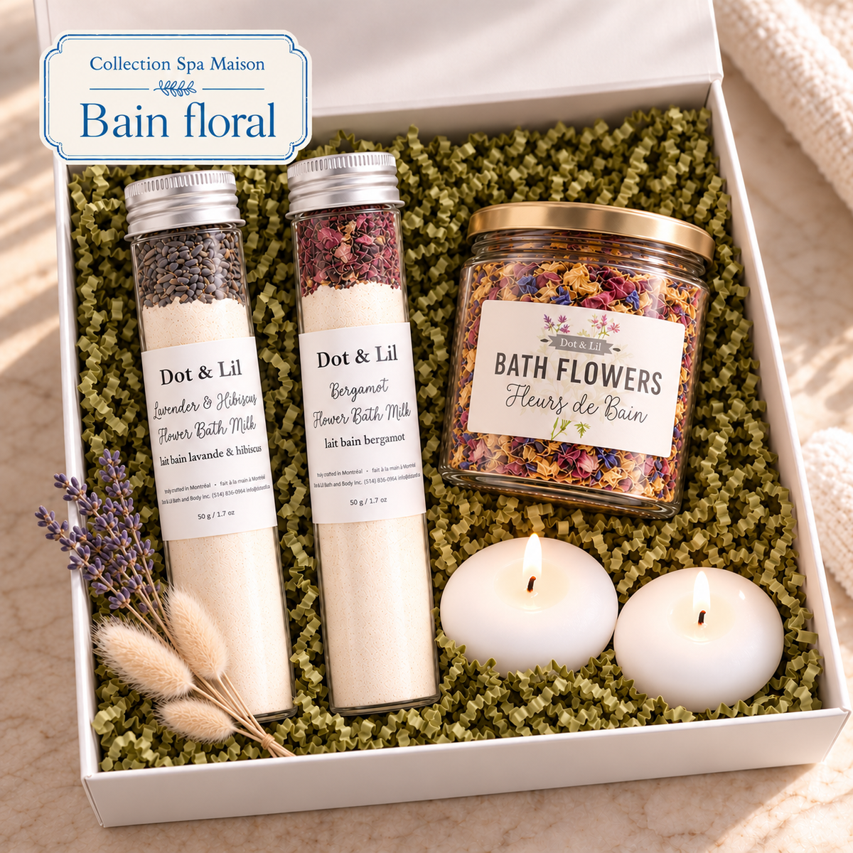 Coffret cadeau Bain floral apaisant Lainoha avec deux laits de bain Dot & Lil, fleurs de bain séchées et deux bougies flottantes dans une boîte blanche.