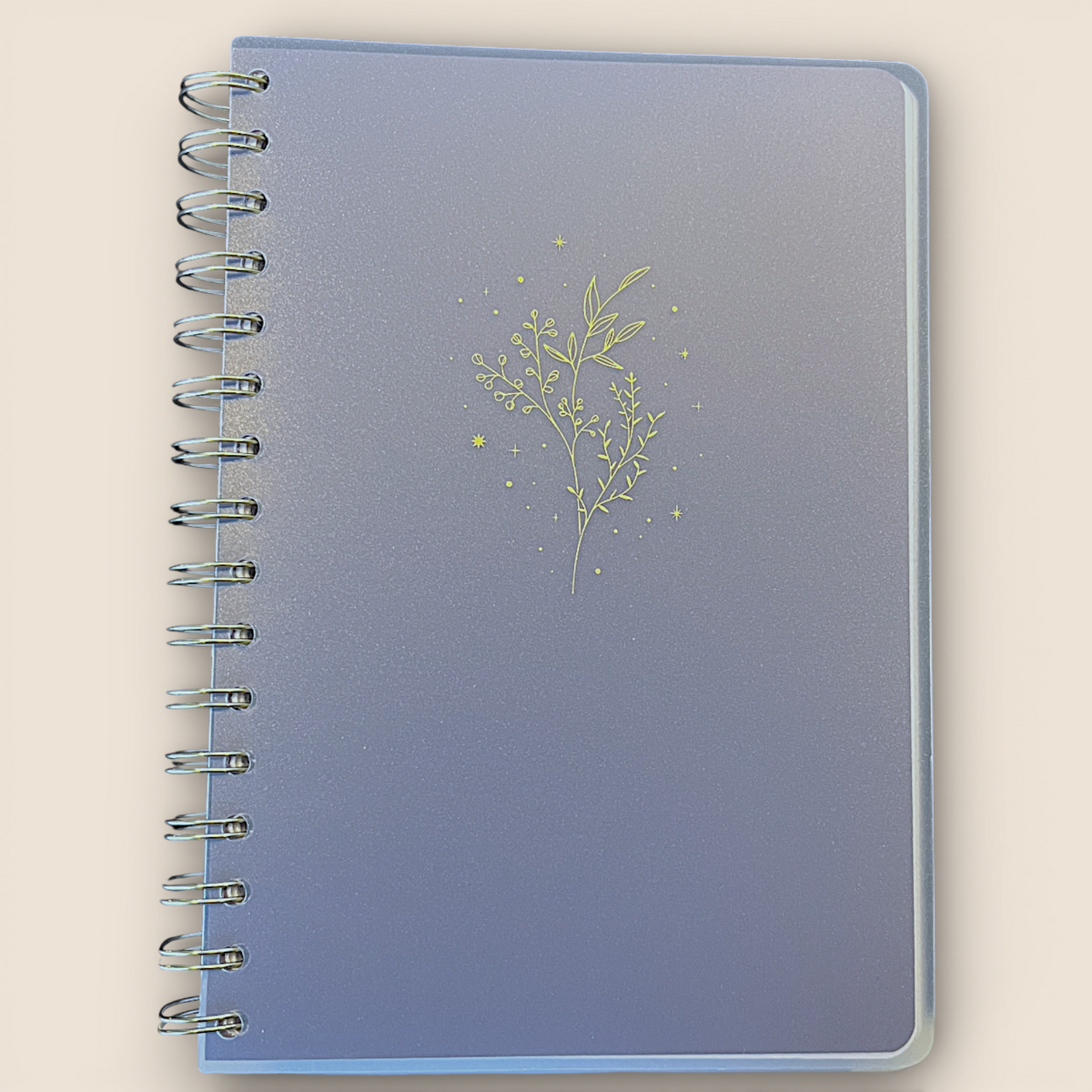 Carnet à spirale dorée – Transparence florale & écriture douce