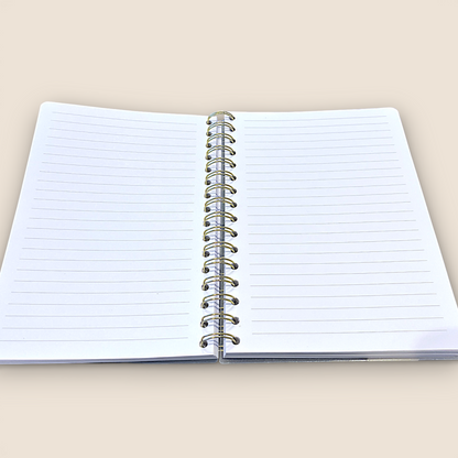 Carnet à spirale dorée – Transparence florale & écriture douce