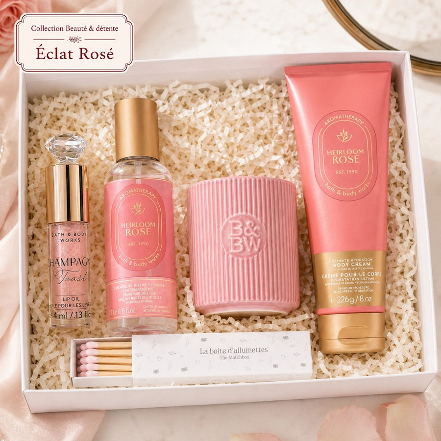 Coffret cadeau beauté Éclat Rosé avec soins Heirloom Rose, bougie rose, huile pour les lèvres Champagne Toast et allumettes rose pâle.