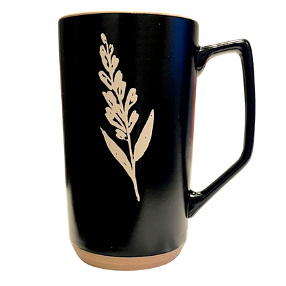Tasse noire au motif botanique blanc